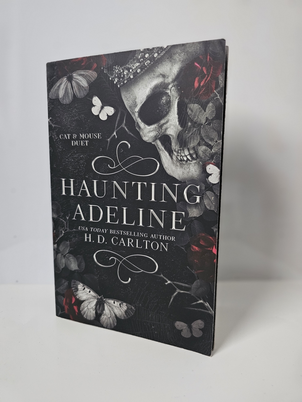Haunting Adeline by H. D. Carlton